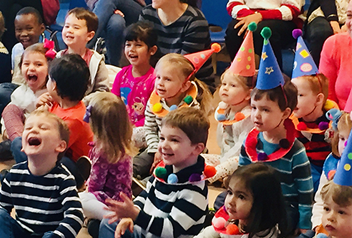 group of kids wearing party hats